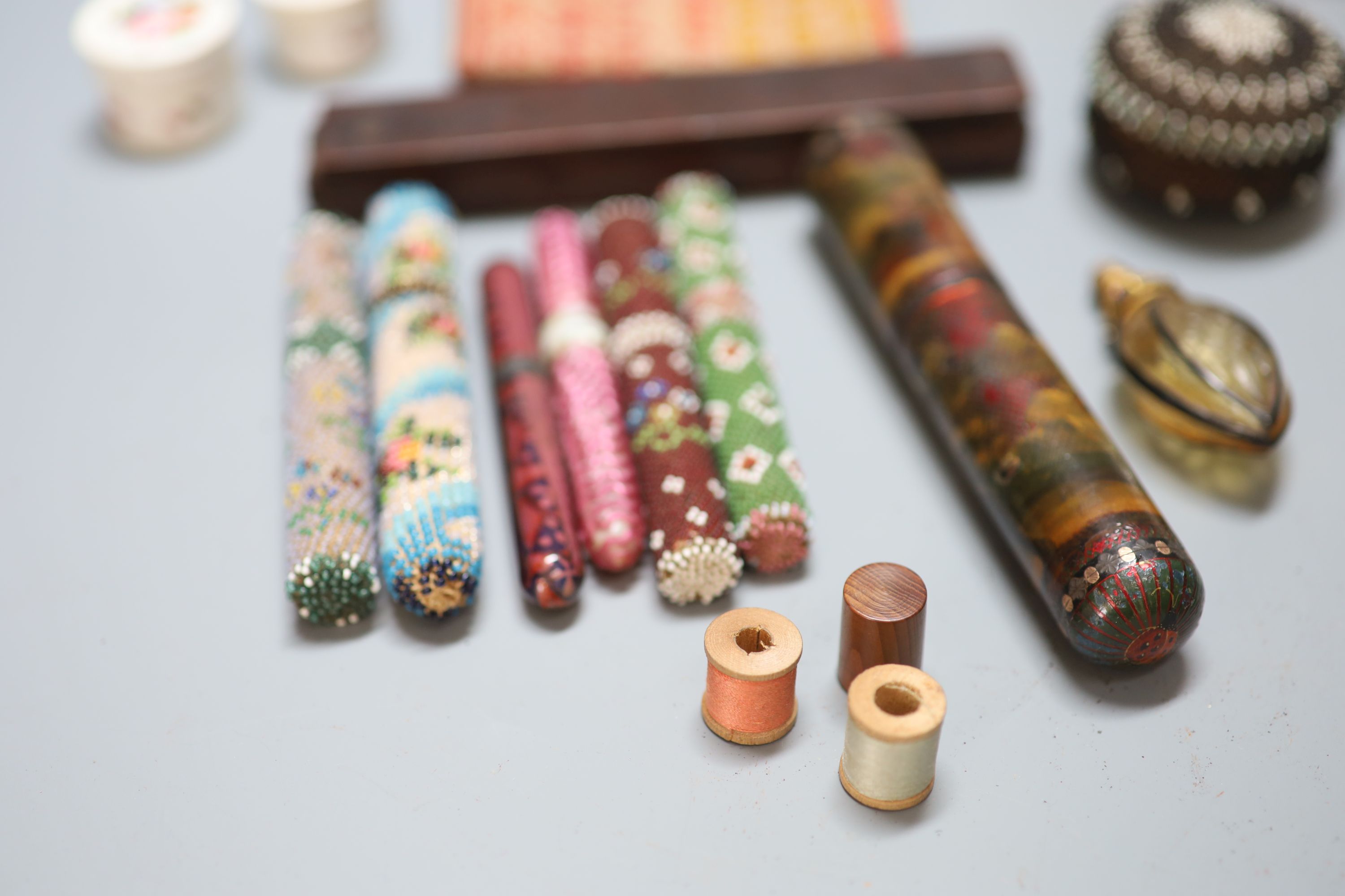 A collection of assorted Victorian and later sewing accessories